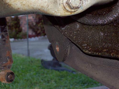 Remove the beam to bracket bolt
