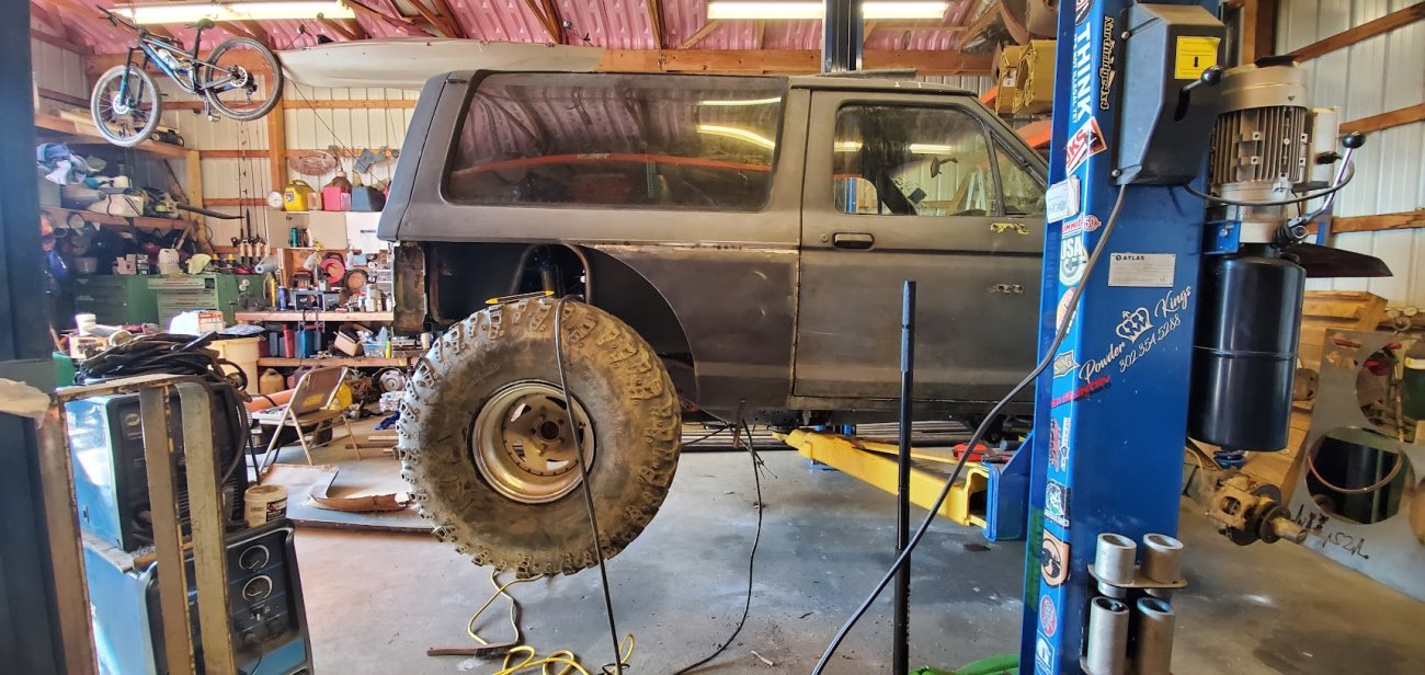 Cutting the quarter panels to fit the tires