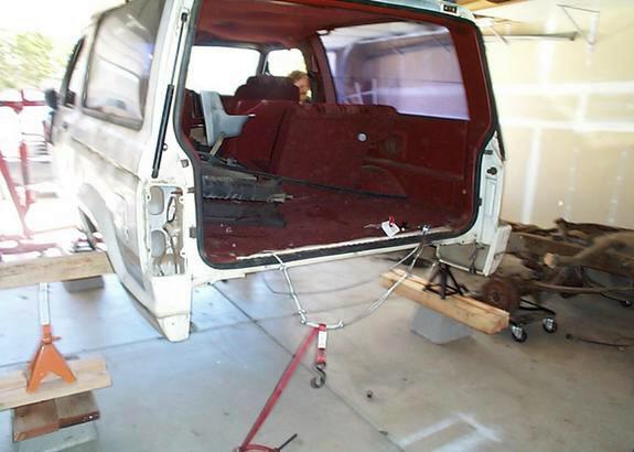 Ford Bronco II body supported by 4x4 wooden posts