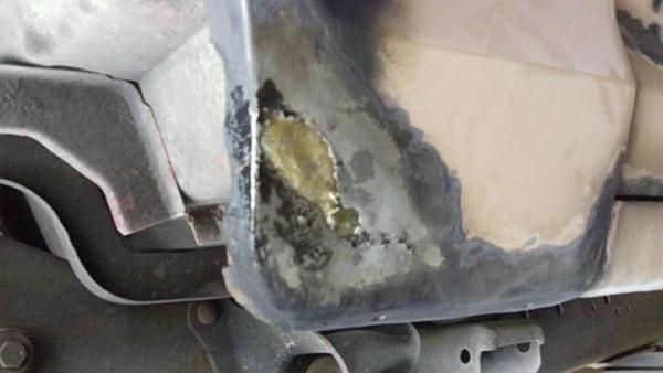 patching rust hole with fiberglass