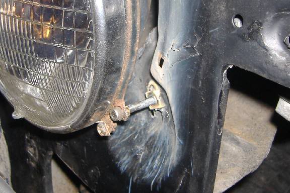 Headlight adjusters
