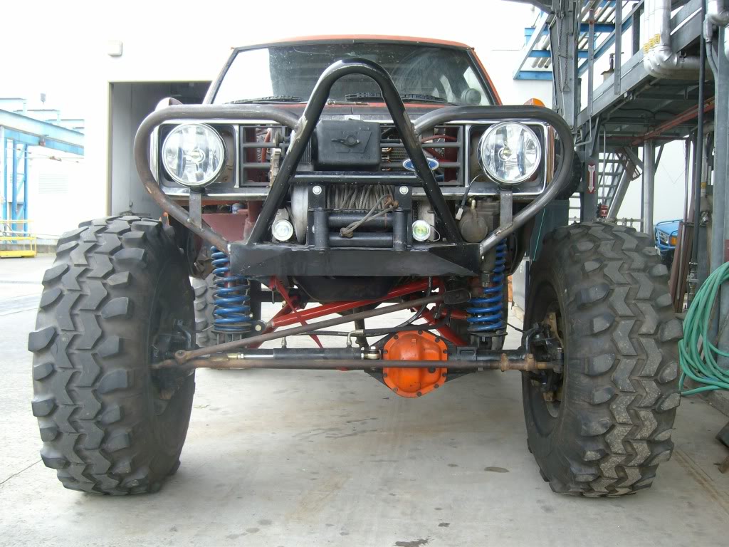 A custom front bumper was built and holds a Warn 8274 winch