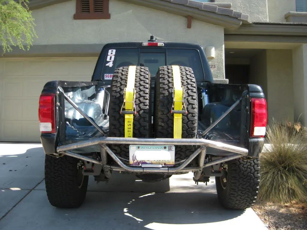 Rear bumper and tire carrier