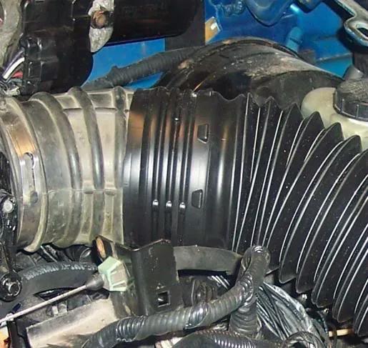 flexible spouting connected to original intake fitting