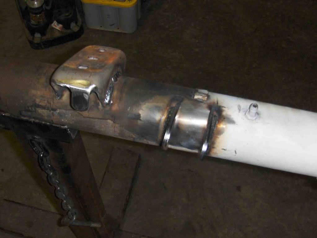 Weld the shock mount at an angle